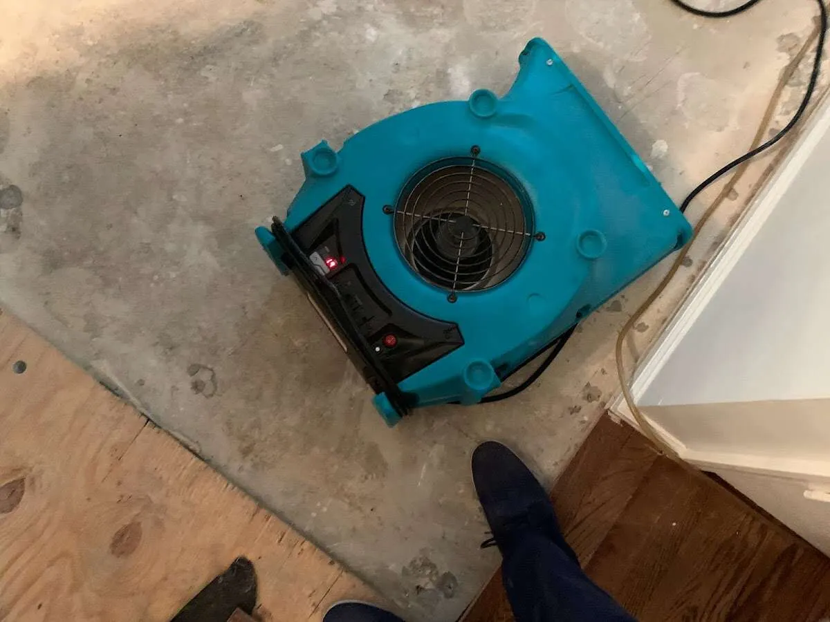 Air mover drying subfloor during Leak Detection & Repair in Mesquite